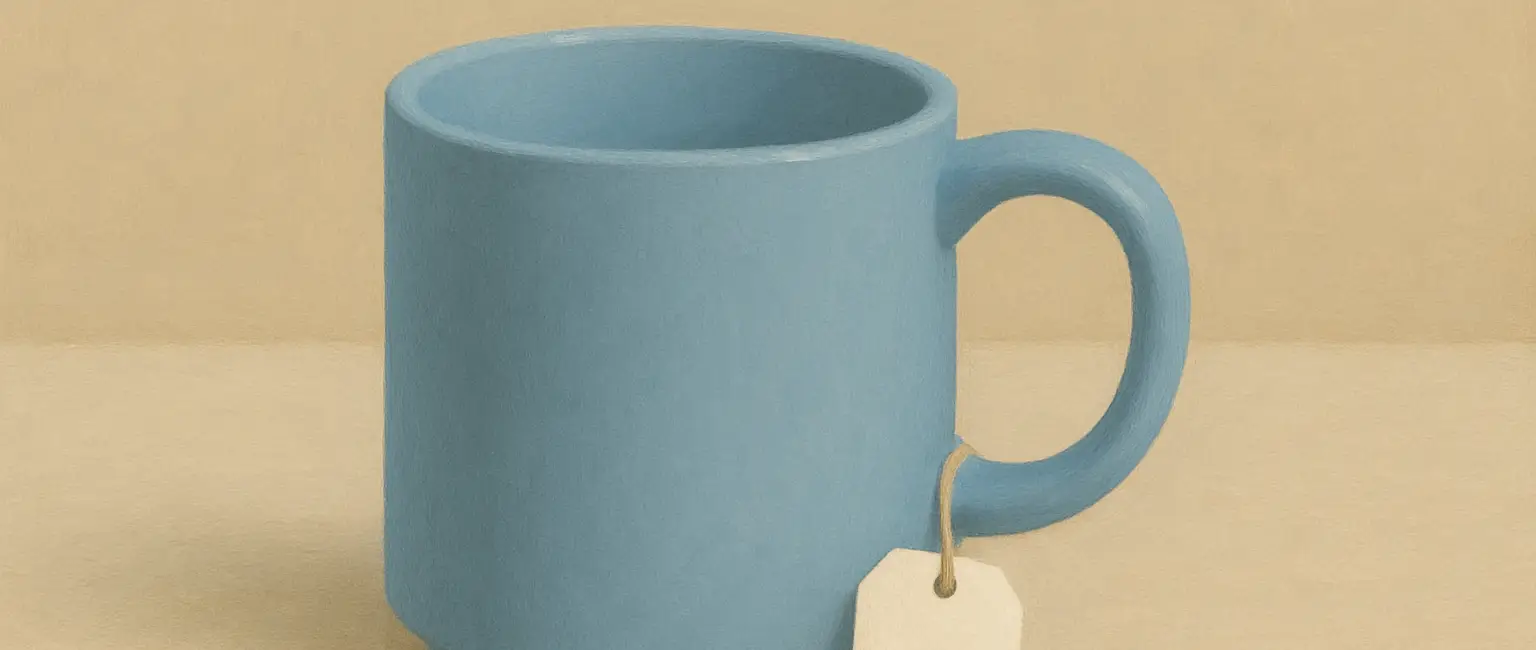 A blue cup with a price tag on it