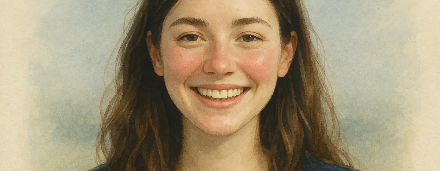 A portrait of a girl smiling.